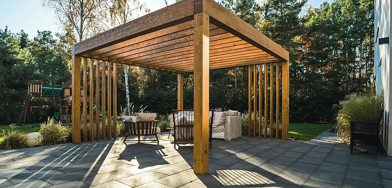 Nowoczesna altana ogrodowa jako całoroczny salon w sercu natury